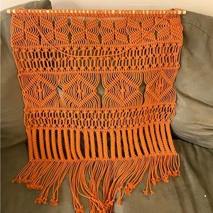 Orange woven wall hanging decoration